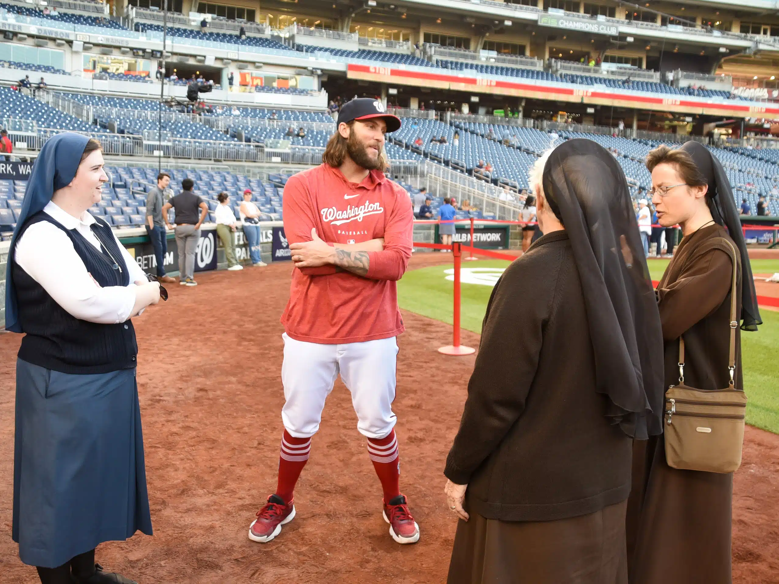 Religious women join Nationals pitcher Trevor Williams for “Ladies Night” - Arlington Catholic Herald